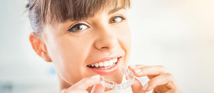 Invisalign vs. Braces for Straightening Your Teeth Questions and Answers Invisalign vs. Braces for Straightening Your Teeth Questions and Answers